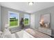 Bright bedroom boasts scenic views and is a perfect retreat for relaxation and rest at 8729 Maxine St # 38, Willow Springs, NC 27592