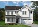 Charming two-story home featuring classic white siding, black shutters, and a well-manicured front lawn at 8733 Maxine St # 37, Willow Springs, NC 27592