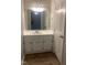 This bathroom features a white vanity, toilet, and combination shower and tub at 912 Pamela Ln, Rocky Mount, NC 27803