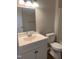 This bathroom features a white vanity, toilet, and combination shower and tub at 912 Pamela Ln, Rocky Mount, NC 27803