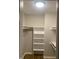 A walk-in closet features built-in shelving and neutral paint at 912 Pamela Ln, Rocky Mount, NC 27803