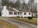 A view of a lovely single-story house, driveway and neatly manicured front yard at 912 Pamela Ln, Rocky Mount, NC 27803