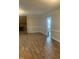 An expansive living area boasting handsome floors and a classic fireplace at 912 Pamela Ln, Rocky Mount, NC 27803