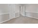 Neutral bedroom featuring neutral carpet, trim, and a fresh coat of paint at 913 Ranch Farm Rd, Raleigh, NC 27603