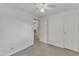 Inviting bedroom with neutral walls, carpet, ceiling fan, and closet space at 913 Ranch Farm Rd, Raleigh, NC 27603