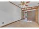 Bonus room featuring brick wall and connection to sunroom at 913 Ranch Farm Rd, Raleigh, NC 27603
