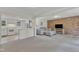 Bright living room boasts plush seating and seamless flow to the kitchen, perfect for entertaining at 913 Ranch Farm Rd, Raleigh, NC 27603