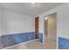 Carpeted Living Room with blue wainscotting and decorative wood built-ins at 913 Ranch Farm Rd, Raleigh, NC 27603