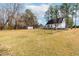Fenced backyard featuring green space, ideal for recreation and pets at 918 Circle Dr, Angier, NC 27501