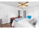 Comfortable bedroom featuring a queen-size bed, hardwood floors, and neutral decor at 918 Circle Dr, Angier, NC 27501