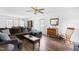 Bright living room with wood floors, cozy seating, and ample natural light at 918 Circle Dr, Angier, NC 27501