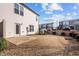 Backyard with a small lawn, small patio, and perimeter fence at 1003 Mirbeck Ln, Durham, NC 27713