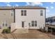 View of a backyard including small lawn and patio at 1003 Mirbeck Ln, Durham, NC 27713