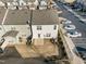 Aerial view of a backyard featuring small lawn, small patio, and fence at 1003 Mirbeck Ln, Durham, NC 27713