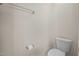 Toilet in a neutral colored bathroom with chrome hardware at 1003 Mirbeck Ln, Durham, NC 27713