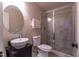 Modern bathroom features a glass-enclosed shower, vessel sink, and stylish tile flooring at 1010 Rosehill Ave, Durham, NC 27705