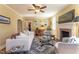 Cozy living room with fireplace, hardwood floors, and an array of artwork at 1010 Rosehill Ave, Durham, NC 27705