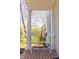 Relaxing porch area with classic white columns and views of the landscaped front yard at 1010 Rosehill Ave, Durham, NC 27705