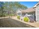 The home offers a backyard with a screened porch, patio, and black metal fence at 1013 Restoration Dr, Durham, NC 27703