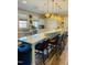 Community kitchen offering barstool seating, ample counter space and stainless appliances at 1013 Restoration Dr, Durham, NC 27703