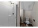 Bathroom showcasing a shower and toilet, highlighting a practical and space-efficient design at 104 Vinewood Pl, Holly Springs, NC 27540