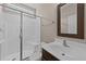 Bathroom featuring glass enclosed shower and vanity with sink at 104 Vinewood Pl, Holly Springs, NC 27540