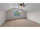 This room includes a window and neutral-colored walls and carpet at 104 Vinewood Pl, Holly Springs, NC 27540