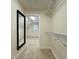 Walk-in closet provides ample storage space and access to additional storage at 104 Vinewood Pl, Holly Springs, NC 27540