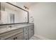 Bathroom with double sink vanity and granite countertop at 1044 S Philwood Ct, Fuquay Varina, NC 27526