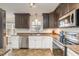 Well-equipped kitchen featuring stainless steel appliances and granite countertops at 1044 S Philwood Ct, Fuquay Varina, NC 27526
