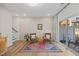 Large basement with hardwood floors, decor, seating area, and walkout access at 1207 Corkery Ridge Ct, Cary, NC 27519