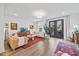 Spacious living room features hardwood floors and a glass door to the back yard at 1207 Corkery Ridge Ct, Cary, NC 27519