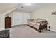 Bedroom featuring neutral walls, carpet, and a bed with a plaid comforter at 1308 Drivers Cir, Rocky Mount, NC 27804