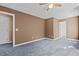 Bedroom featuring carpet, neutral walls, and a ceiling fan with light fixture at 1324 Emerson Cook Rd, Pittsboro, NC 27312