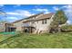 Exterior shot of a home with a patio, backyard and a deck at 1416 Endgame Ct, Wake Forest, NC 27587