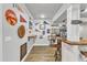 Finished basement featuring a bar area with wall decor and barstools at 1416 Endgame Ct, Wake Forest, NC 27587