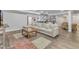 Finished basement with a sectional sofa, tv, and bar area at 1416 Endgame Ct, Wake Forest, NC 27587