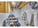 Unfinished basement area featuring storage shelves with lighting at 1416 Endgame Ct, Wake Forest, NC 27587