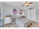 Cozy bedroom with ceiling fan, neutral walls, carpet floors, and stylish decor, and a study station at 1416 Endgame Ct, Wake Forest, NC 27587