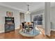 Cozy dining area with modern lighting and access to the outdoor deck at 1416 Endgame Ct, Wake Forest, NC 27587