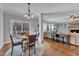 Dining area with slider door access and hardwood flooring at 1416 Endgame Ct, Wake Forest, NC 27587