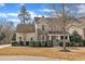 Charming two-story home with stone accents, manicured landscaping, and inviting curb appeal at 1416 Endgame Ct, Wake Forest, NC 27587