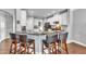 Gourmet kitchen featuring granite counters, stainless steel appliances, and breakfast bar at 1416 Endgame Ct, Wake Forest, NC 27587
