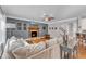 Bright and airy living room boasts a fireplace and an open layout to the foyer at 1416 Endgame Ct, Wake Forest, NC 27587