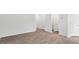Bright living room featuring hardwood flooring and neutral paint, ready for personalization and comfortable living at 172 Starlight St, Sanford, NC 27330