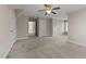 Spacious bedroom featuring neutral colors and trim, carpet, and closet spaces at 1818 Buxton Way, Burlington, NC 27215