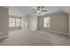 Bright bedroom with large windows for natural light and standard ceiling fan at 1818 Buxton Way, Burlington, NC 27215