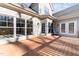 Sunny deck area with access to the home's interior through glass doors at 1818 Buxton Way, Burlington, NC 27215