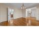 Bright and spacious dining room with hardwood flooring at 1818 Buxton Way, Burlington, NC 27215