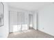Bedroom featuring carpet, a closet with bi-fold doors, and white painted walls at 198 Ridge Trl, Chapel Hill, NC 27516